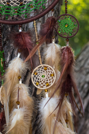 Dream catcher with feathers threads and beads rope hanging. Dreamcatcher handmadeの写真素材