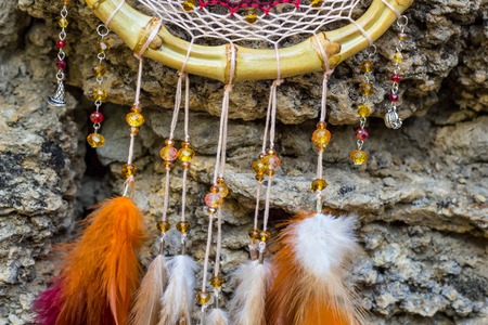 Dream catcher with feathers threads and beads rope hanging. Dreamcatcher handmadeの写真素材