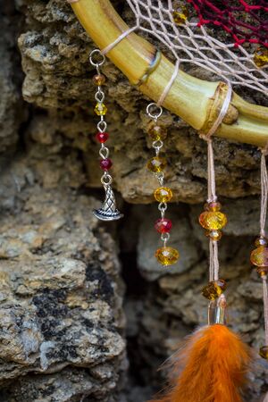 Dream catcher with feathers threads and beads rope hanging. Dreamcatcher handmadeの写真素材