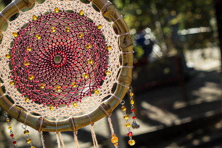 Dream catcher with feathers threads and beads rope hanging. Dreamcatcher handmadeの写真素材