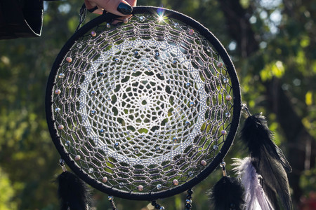 Dream catcher with feathers threads and beads rope hanging. Dreamcatcher handmadeの写真素材
