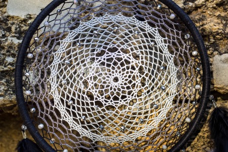 Dream catcher with feathers threads and beads rope hanging. Dreamcatcher handmadeの写真素材
