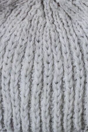 Sweater or scarf Pattern Of White Knitted Fabric Texture Background.の写真素材