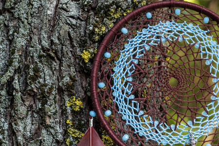 Dream catcher with feathers threads and beads rope hanging. Dreamcatcher handmadeの写真素材