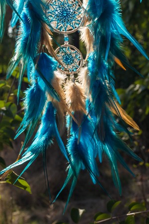 Dream catcher with feathers threads and beads rope hanging. Dreamcatcher handmadeの写真素材