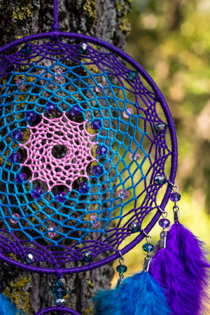 Dream catcher with feathers threads and beads rope hanging. Dreamcatcher handmadeの写真素材