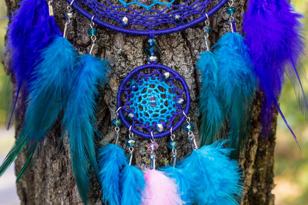 Dream catcher with feathers threads and beads rope hanging. Dreamcatcher handmadeの写真素材