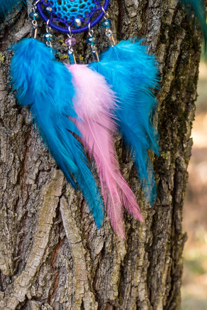 Dream catcher with feathers threads and beads rope hanging. Dreamcatcher handmadeの写真素材