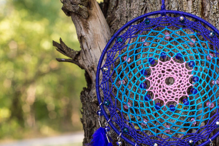 Dream catcher with feathers threads and beads rope hanging. Dreamcatcher handmadeの写真素材