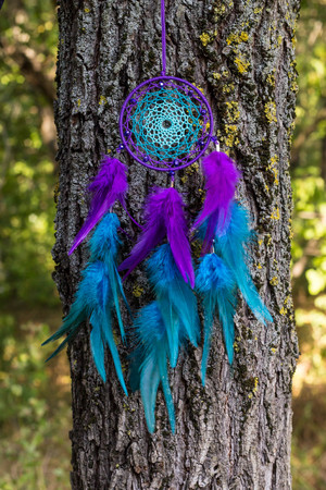 Dream catcher with feathers threads and beads rope hanging. Dreamcatcher handmadeの写真素材