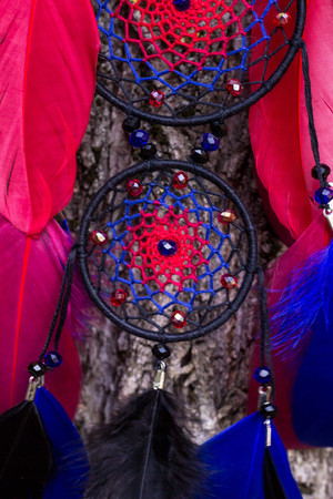 Dream catcher with feathers threads and beads rope hanging. Dreamcatcher handmadeの写真素材