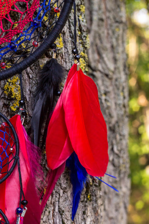 Dream catcher with feathers threads and beads rope hanging. Dreamcatcher handmadeの写真素材
