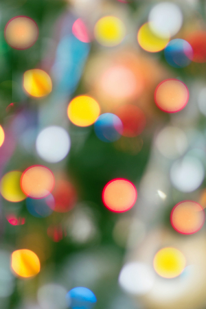 defocused christmas lights background with colofrul bokeh.の写真素材