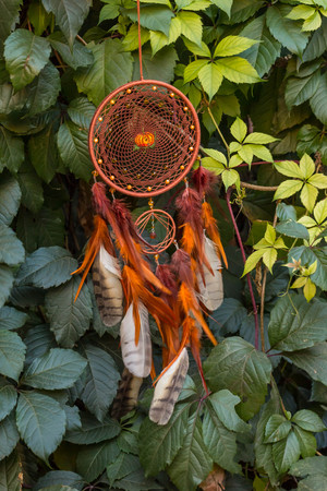 Dream catcher with feathers threads and beads rope hanging. Dreamcatcher handmadeの写真素材