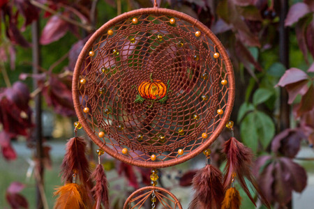 Dream catcher with feathers threads and beads rope hanging. Dreamcatcher handmadeの写真素材