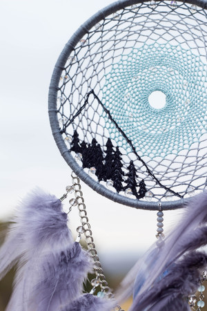 Dream catcher with feathers threads and beads rope hanging. Dreamcatcher handmadeの写真素材