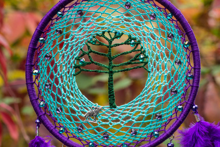 Dream catcher with feathers threads and beads rope hanging. Dreamcatcher handmadeの写真素材