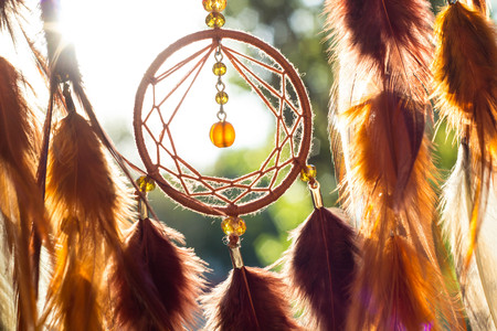 Dream catcher with feathers threads and beads rope hanging. Dreamcatcher handmadeの写真素材