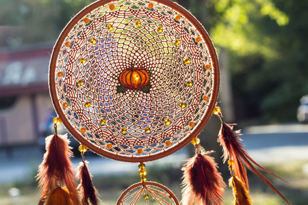 Dream catcher with feathers threads and beads rope hanging. Dreamcatcher handmadeの写真素材