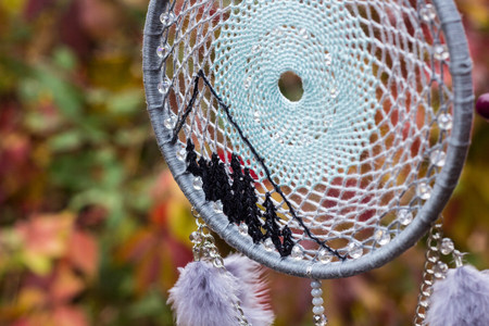 Dream catcher with feathers threads and beads rope hanging. Dreamcatcher handmade