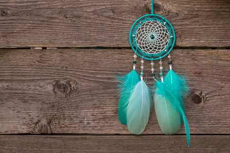 Dream catcher with feathers threads and beads rope hanging. Dreamcatcher handmadeの写真素材