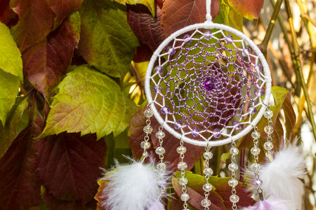 Dream catcher with feathers threads and beads rope hanging. Dreamcatcher handmadeの写真素材