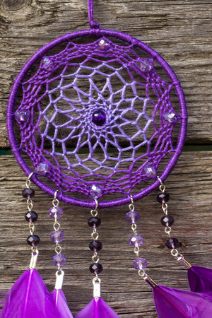 Dream catcher with feathers threads and beads rope hanging. Dreamcatcher handmadeの写真素材