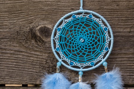 Dream catcher with feathers threads and beads rope hanging. Dreamcatcher handmadeの写真素材