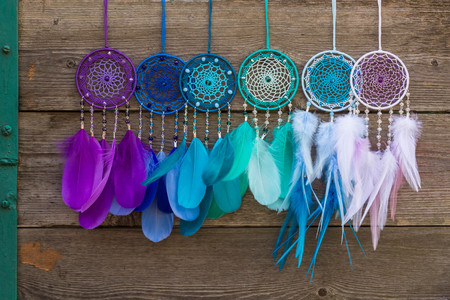 Dream catcher with feathers threads and beads rope hanging. Dreamcatcher handmadeの写真素材