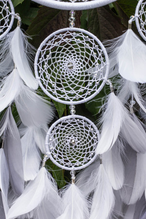 Dream catcher with feathers threads and beads rope hanging. Dreamcatcher handmadeの写真素材