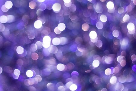Blue shiny glitter holiday beautiful abstract blur bokeh background.の写真素材