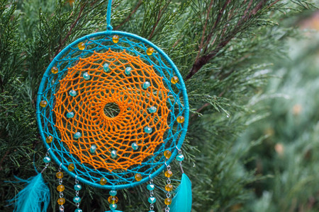 Dream catcher with feathers threads and beads rope hanging. Dreamcatcher handmadeの写真素材