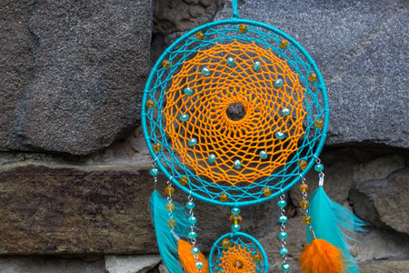 Dream catcher with feathers threads and beads rope hanging. Dreamcatcher handmadeの写真素材