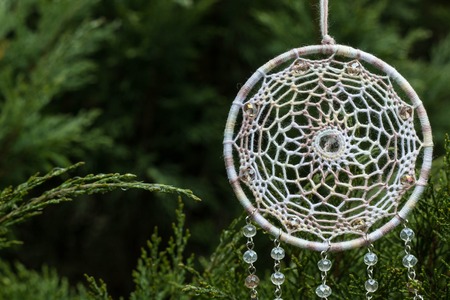 Dream catcher with feathers threads and beads rope hanging. Dreamcatcher handmadeの写真素材