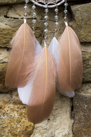 Dream catcher with feathers threads and beads rope hanging. Dreamcatcher handmadeの写真素材