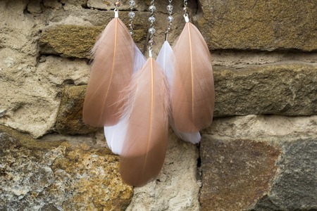 Dream catcher with feathers threads and beads rope hanging. Dreamcatcher handmadeの写真素材