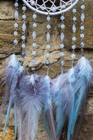 Dream catcher with feathers threads and beads rope hanging. Dreamcatcher handmadeの写真素材