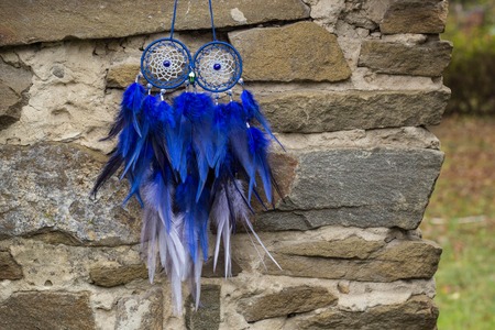 Dream catcher with feathers threads and beads rope hanging. Dreamcatcher handmadeの写真素材