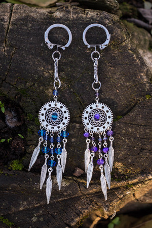Dream catcher with feathers threads and beads rope hanging. Dreamcatcher handmadeの写真素材