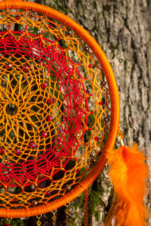 Dream catcher with feathers threads and beads rope hanging. Dreamcatcher handmadeの写真素材