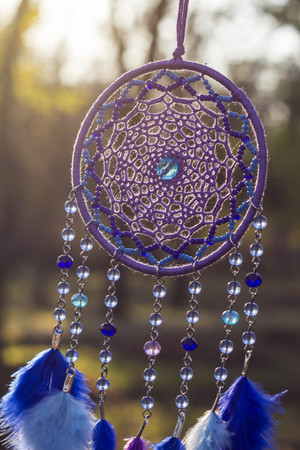Dream catcher with feathers threads and beads rope hanging. Dreamcatcher handmadeの写真素材