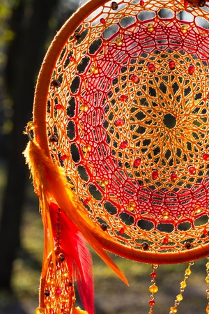 Dream catcher with feathers threads and beads rope hanging. Dreamcatcher handmadeの写真素材