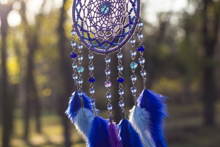 Dream catcher with feathers threads and beads rope hanging. Dreamcatcher handmadeの写真素材