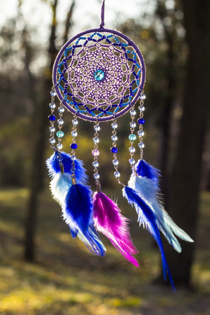 Dream catcher with feathers threads and beads rope hanging. Dreamcatcher handmadeの写真素材