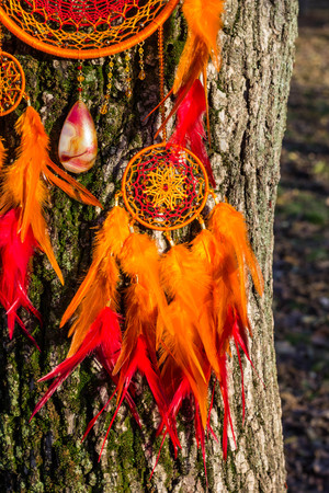 Dream catcher with feathers threads and beads rope hanging. Dreamcatcher handmadeの写真素材