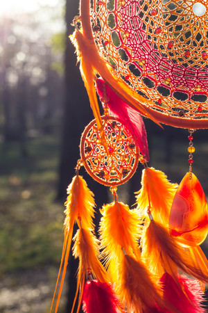 Dream catcher with feathers threads and beads rope hanging. Dreamcatcher handmadeの写真素材