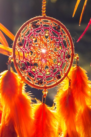 Dream catcher with feathers threads and beads rope hanging. Dreamcatcher handmadeの写真素材