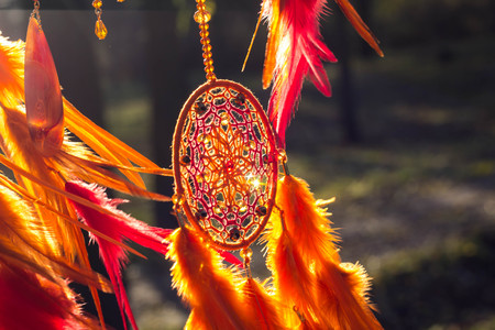Dream catcher with feathers threads and beads rope hanging. Dreamcatcher handmadeの写真素材