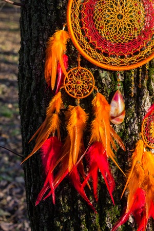 Dream catcher with feathers threads and beads rope hanging. Dreamcatcher handmadeの写真素材