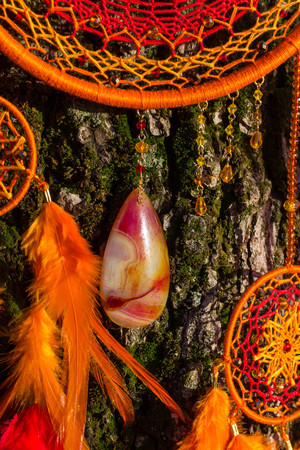 Dream catcher with feathers threads and beads rope hanging. Dreamcatcher handmadeの写真素材